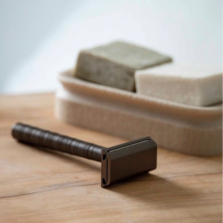 Henson AL13 razor beside shaving soap